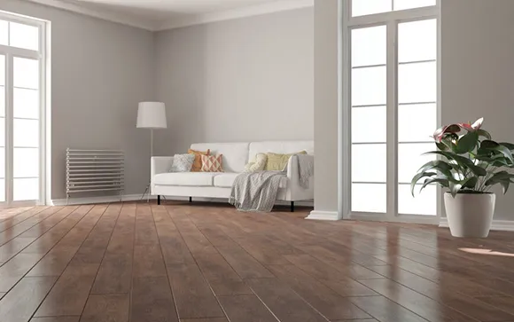 Bright living room with newly installed light hardwood flooring and minimalist decor.