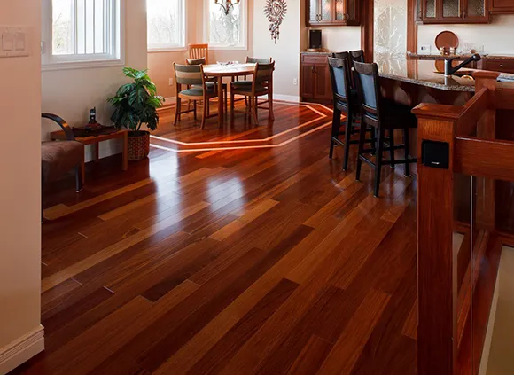 Warm-toned dining room with polished water-resistant laminate flooring in Madison Heights MI.
