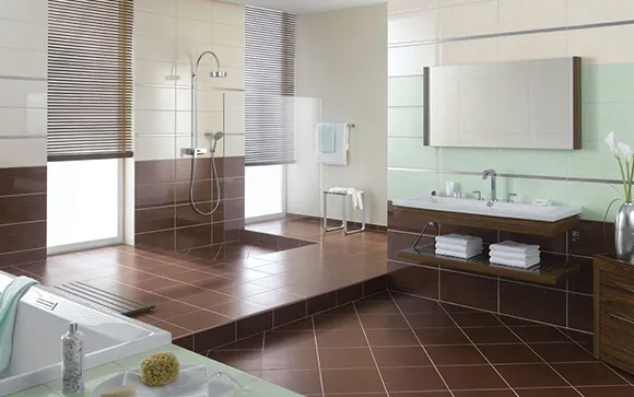 Stylish kitchen featuring sleek dark ceramic tile flooring, wooden cabinets, and modern appliances.