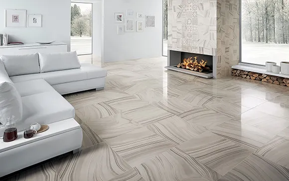 Spacious living room with light gray ceramic tile flooring and white fireplace in a modern home.