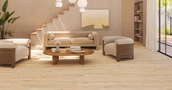 Cozy living room with light-colored laminate flooring and modern, neutral-toned furniture.